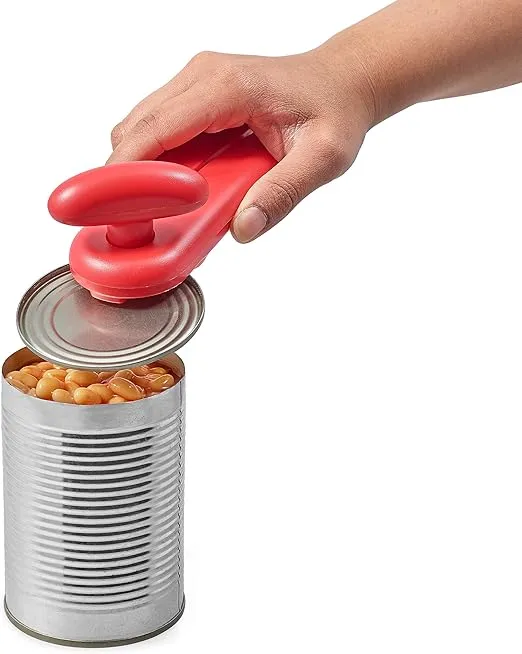 Zyliss MagiCan Manual Can Opener with Lid Release - Heavy Duty Can Opener Kitchen Gadgets - Home Can Opener Manual- Easy to Use Hand Held Can Opener - Effortlessly Open Cans - Compact Design - Red