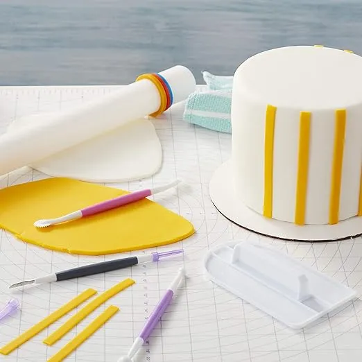 Wilton Basic 3-Piece Fondant and Gum Paste Tool Set - It Includes a Standard Ball Tool, Quilting/Stitching Tool and Cutting Blade/Pick Tool