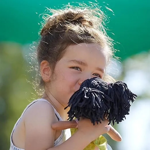 HABA Cari 12" Soft Doll - Machine Washable with Green Dress, Embroidered Face, Brown Eyes and Black Pigtails