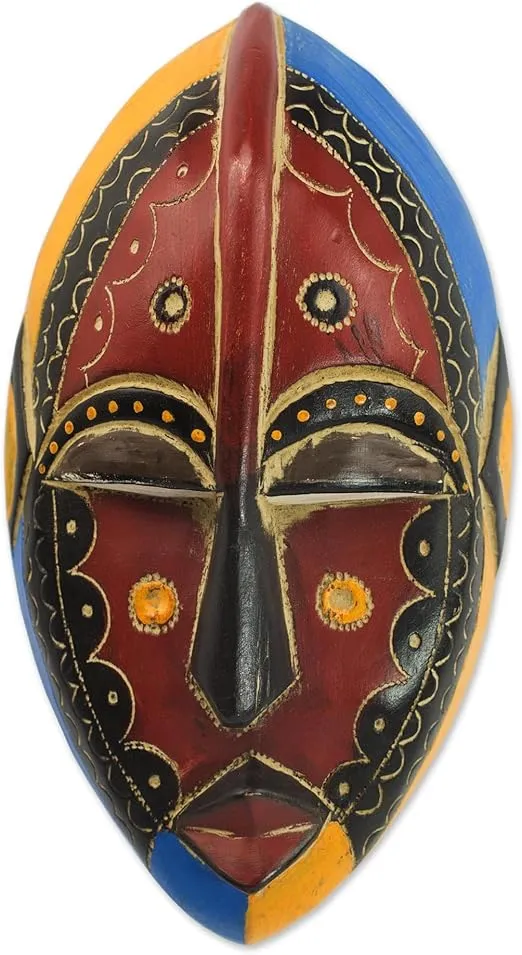 NOVICA Artisan Handcarved African Wood Mask Wooden Igbo Brown Black Yellow Blue Ghana Masks [9.75in H x 5.25in W x 2.4in D] ' Uzoma'