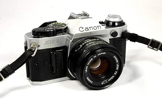 Vintage Canon AE-1 Program 35mm SLR Camera with 50mm 1:1.8 Lens (Renewed)