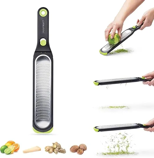 Dreamfarm Ozest Self-Cleaning POP-Button Zester for Fine, Fluffy Citrus Zest, Cheese, Nut, & Spices with Non-Slip Silicone Foot - 1mm Zester, Black/Green